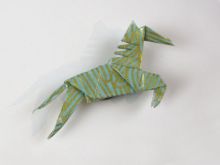 Kleines Origami-ART Unikat Magnet Springpferd Korallenriff türkis Washi